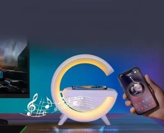 مكبر صوت بلوتوث بإضاءة LED وشحن لاسلكي – تصميم عصري متعدد الاستخدامات